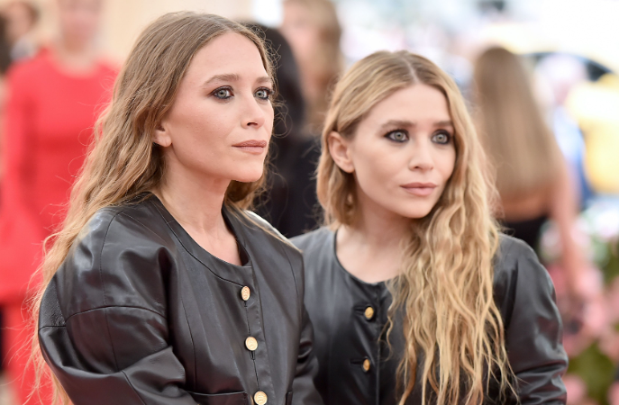 Mary-Kate and Ashley Olsen in coordinating black leather jackets at Met Gala.