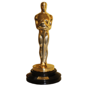 Golden Oscar trophy standing on a black pedestal.