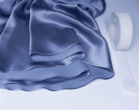Satin ribbon with a melted edge finish.