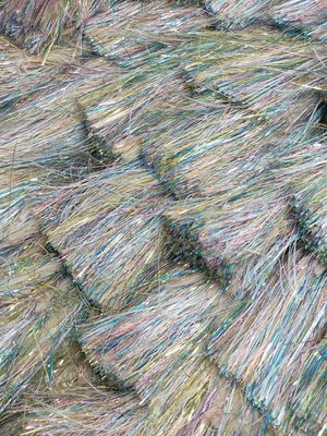 Soft iridescent pastel fibers in a woven texture.