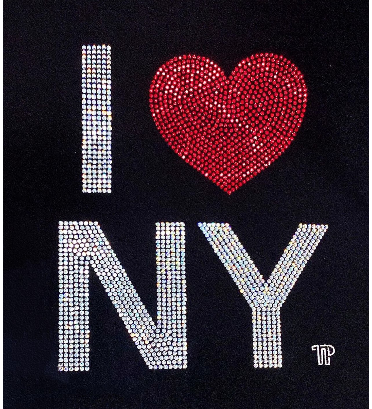 Sparkling rhinestone “I ❤️ NY” design on black fabric.