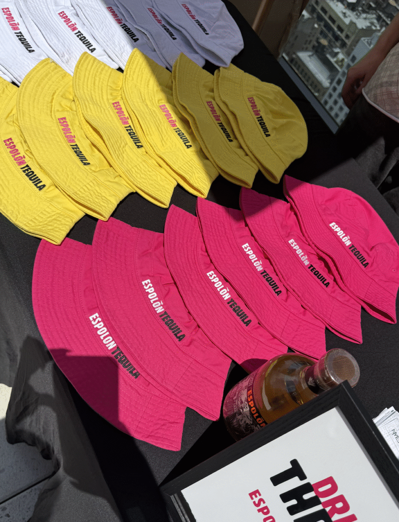 pink, yellow, and white bucket hat embroidery - customization on-site