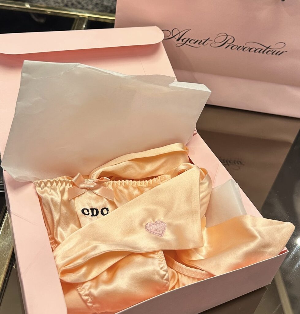 Live Embroidery with Agent Provocateur on silk pajamas, robes, and underwear