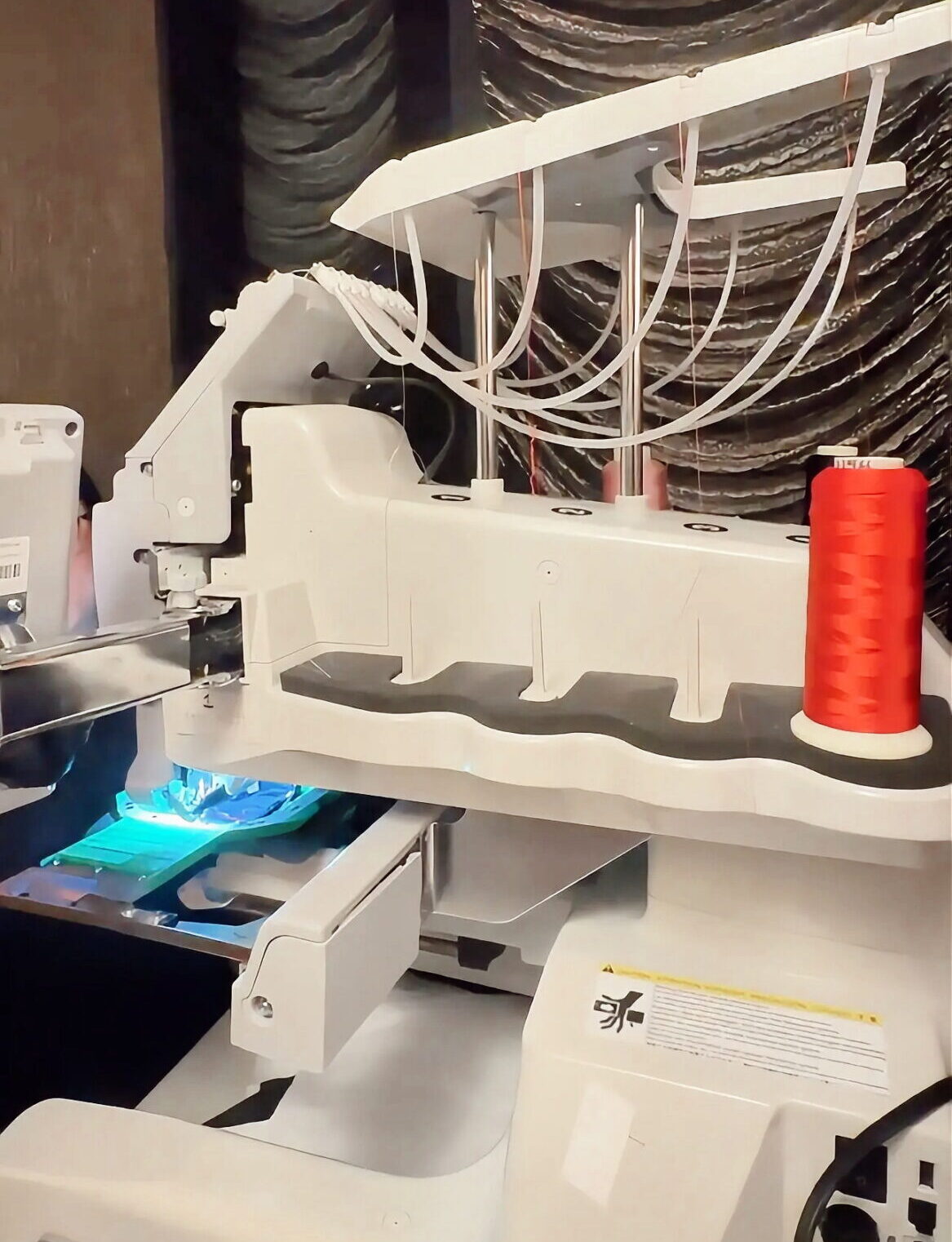 Live Embroidery with Agent Provocateur on silk pajamas, robes, and underwear