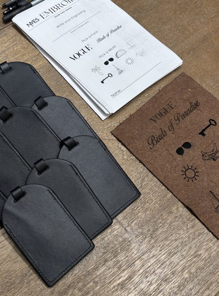 live laser engraving nyc for fora travel on black luggage tags