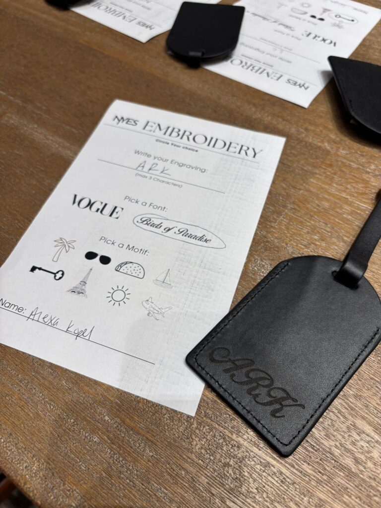 live laser engraving nyc for fora travel on black luggage tags