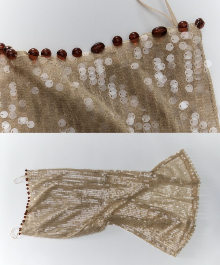 J.Crew reworked vintage garment, featuring added fur details for texture and intricate hand-applied beadwork for individuality.