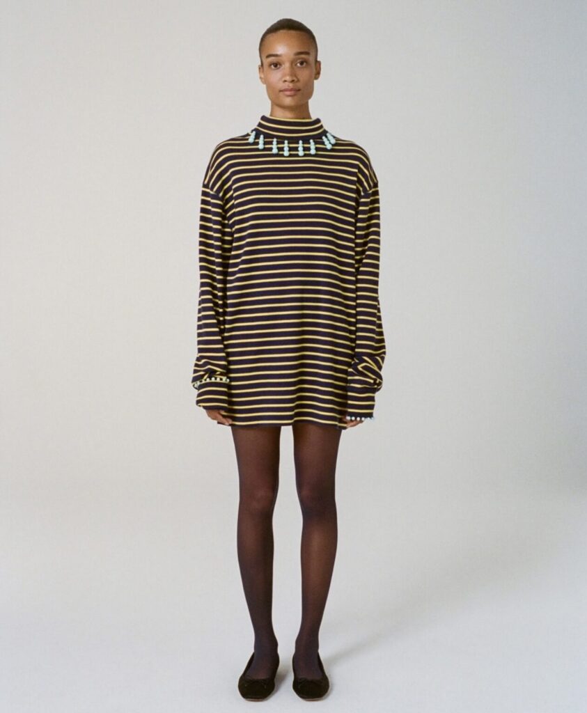 J.Crew reworked vintage garment, featuring added fur details for texture and intricate hand-applied beadwork for individuality.