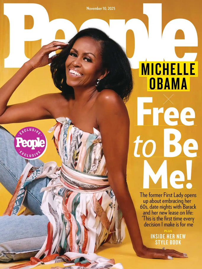 Michelle Obama standing against a textured yellow wall wearing a multicolored ribbon-strip top with long flowing ties and denim pants in an editorial portrait for People magazine.