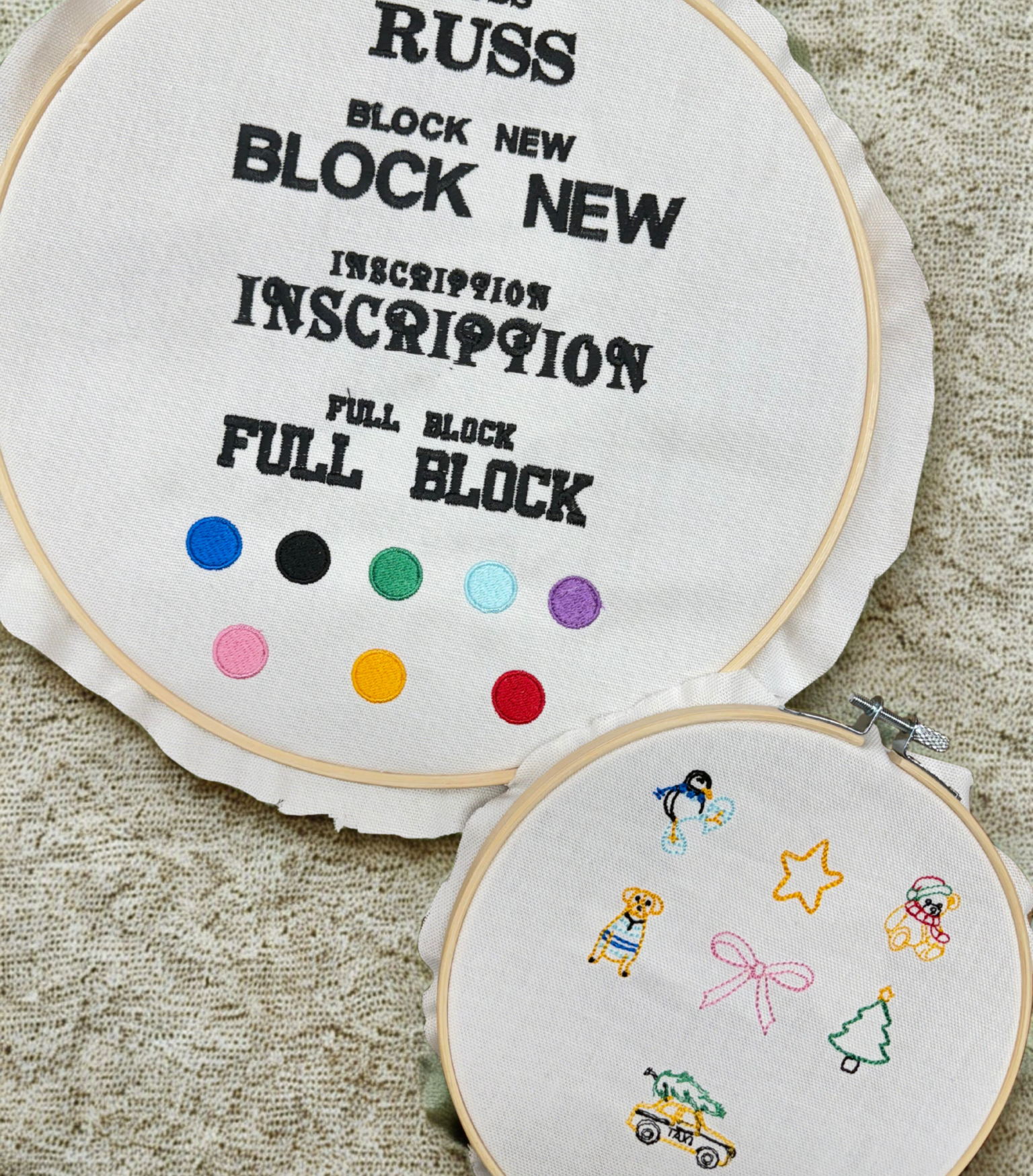 Embroidery samples showing NYES’s custom font options, thread color selections, and stitched holiday motifs, including a penguin, bow, Christmas tree, taxi, bear, and star—displayed in hoops for Lands’ End’s Chaotically Customized Holiday Shop