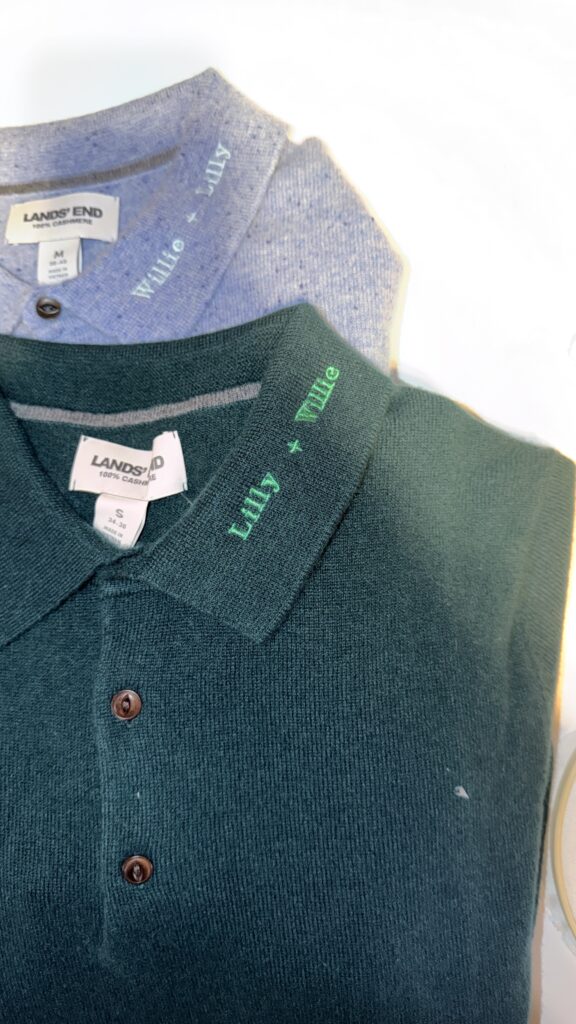 Embroidered totes and sweaters featuring personalized names, initials, and holiday motifs created by New York Embroidery Studio for live event customization.