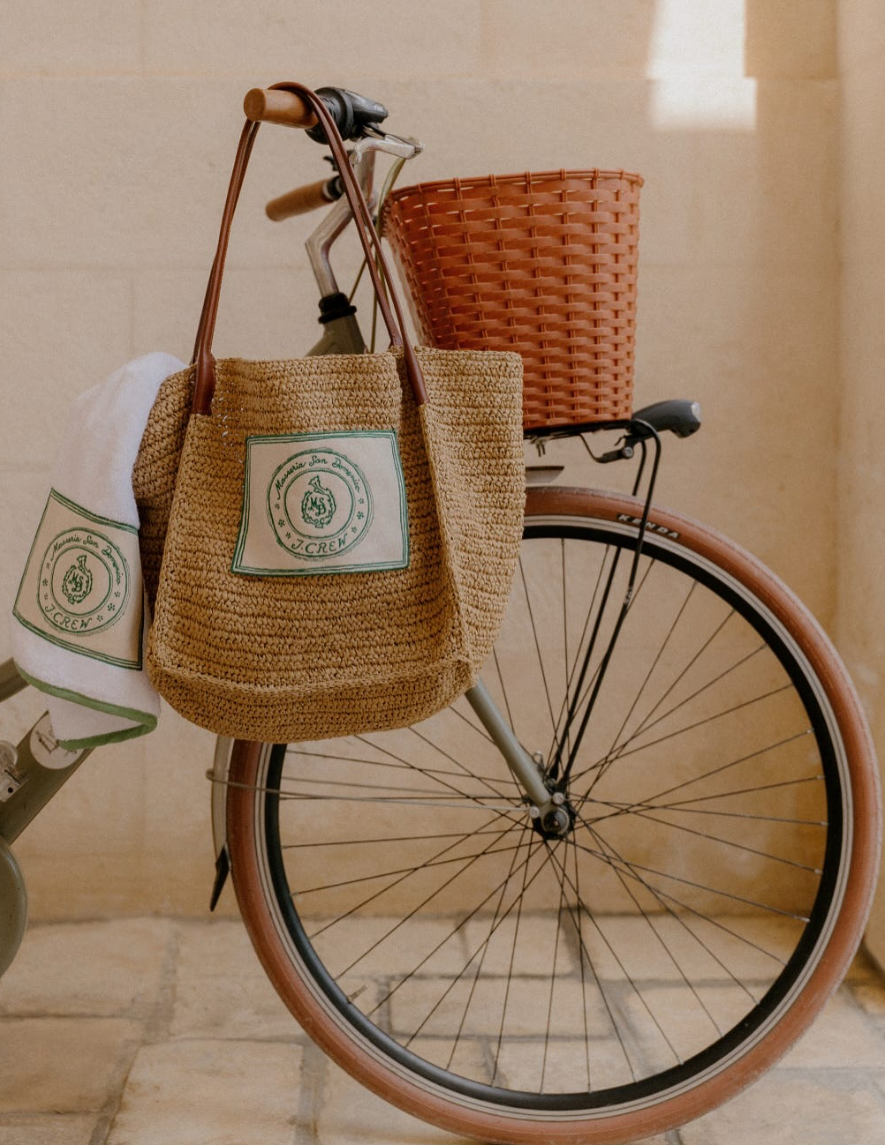 Woven bag featuring custom embroidered J.Crew patch application