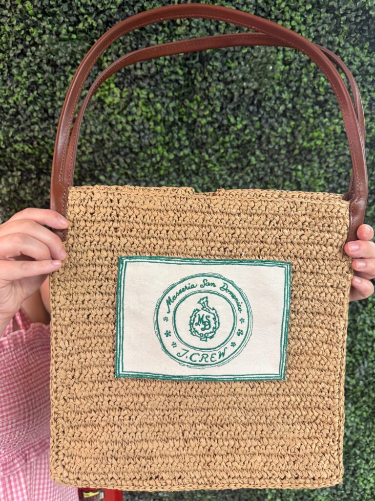 Woven bag featuring custom embroidered J.Crew patch application