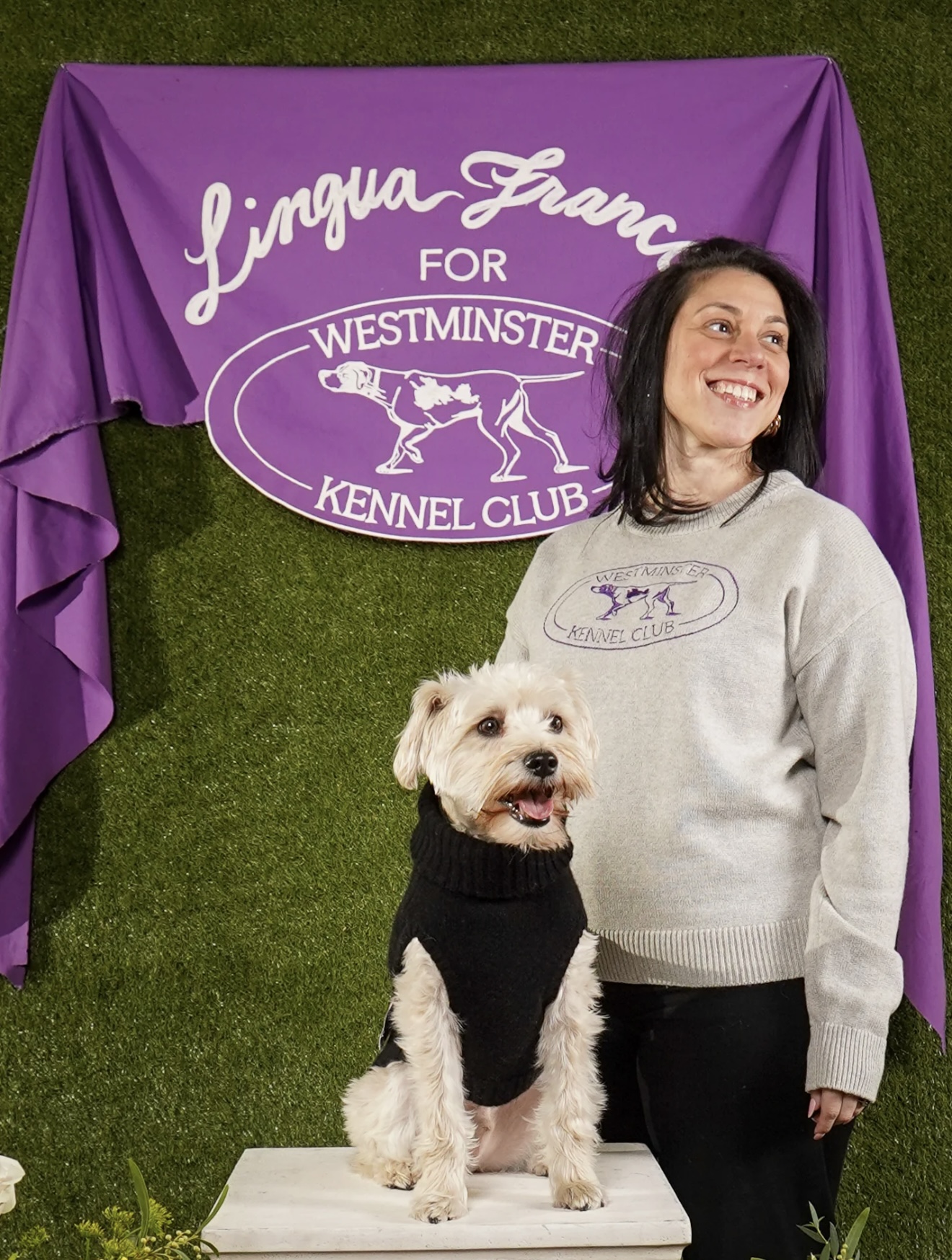Chain stitch embroidered banner for Lingua Franca featuring white lettering and dog illustration on purple fabric for the Westminster Kennel Club Dog Show