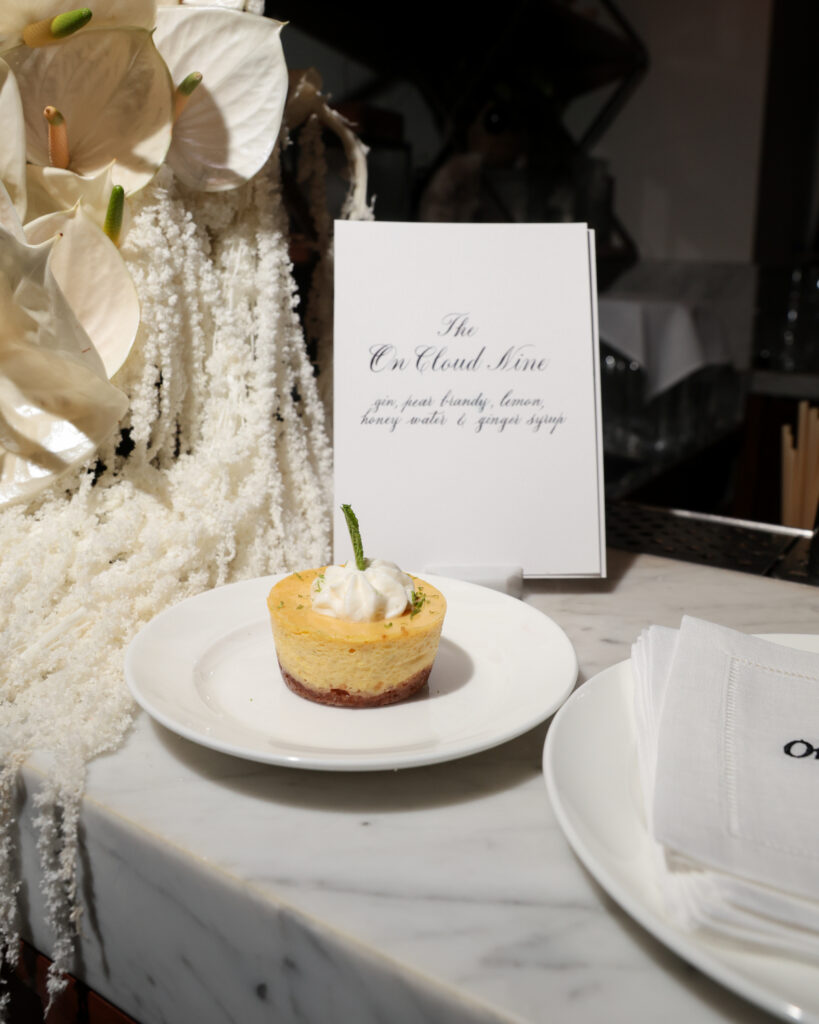 Custom embroidered linen napkins with calligraphy menu and place card at Intimissimi Ultralight Cotton Collection event in Los Angeles