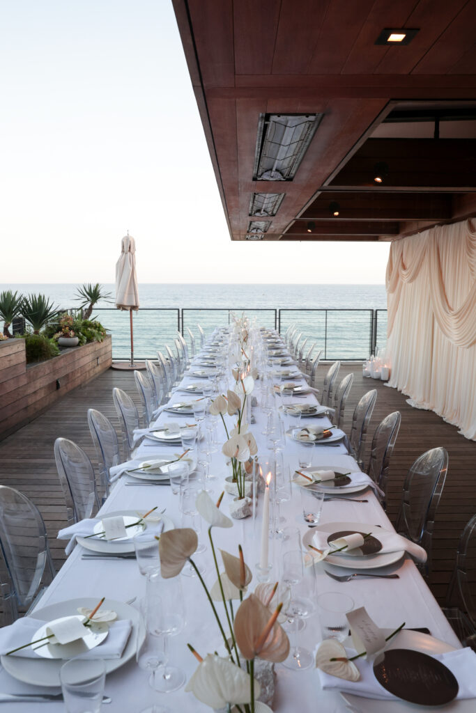 Custom embroidered linen napkins with calligraphy menu and place card at Intimissimi Ultralight Cotton Collection event in Los Angeles