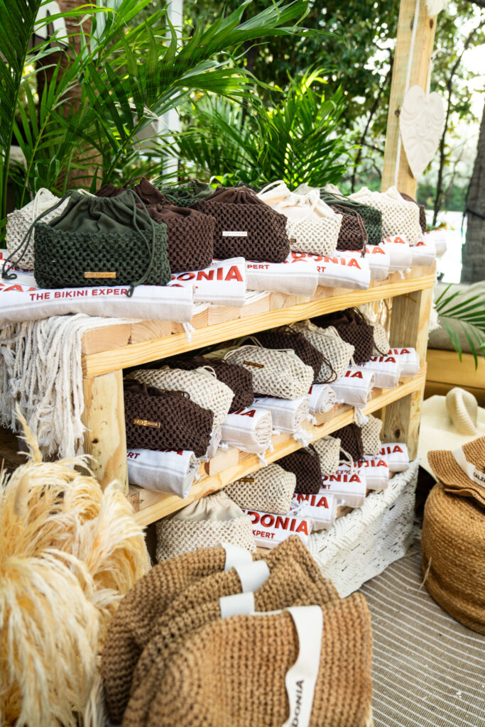 Custom embroidered Calzedonia towels displayed at Soho Beach House Miami event