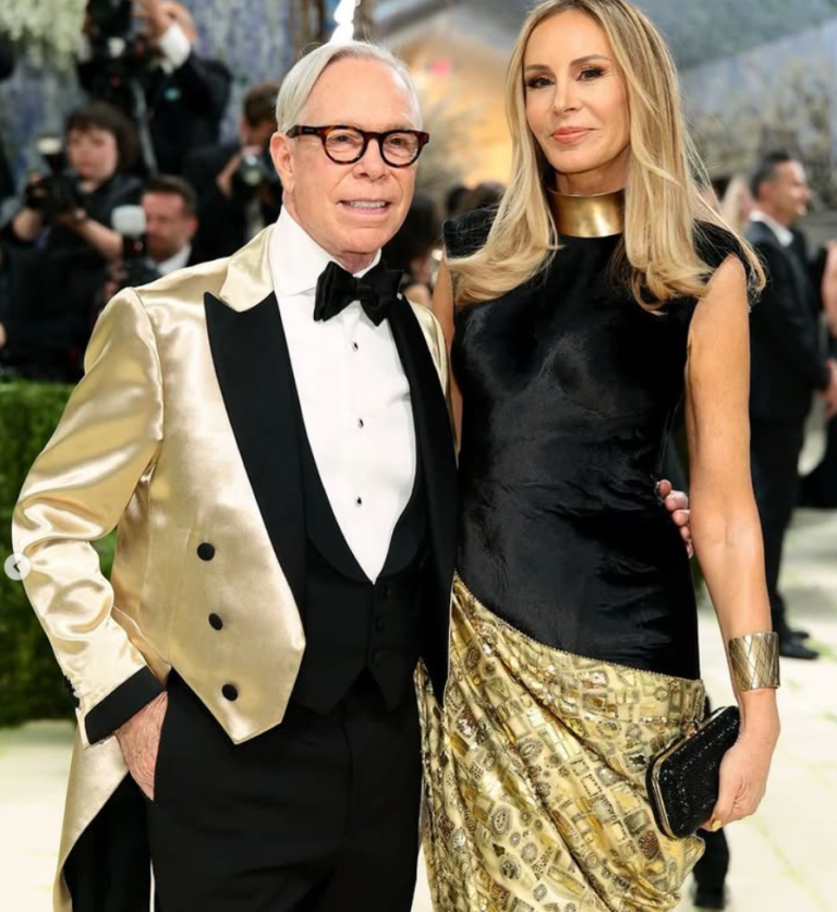 Dee Ocleppo Hilfiger at the 2026 Met Gala wearing a custom Tommy Hilfiger and Joel Jolibe gold gown inspired by Gustav Klimt’s Portrait of Adele Bloch-Bauer I. The dress features layers of gold crystals, foil, and intricate hand-beading.