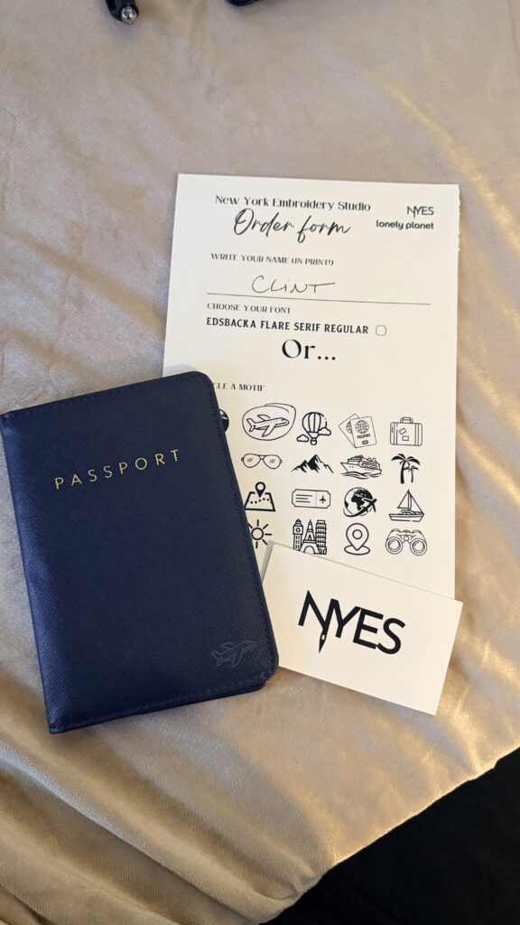 NYES live laser engraving station personalizing leather passport covers for guests