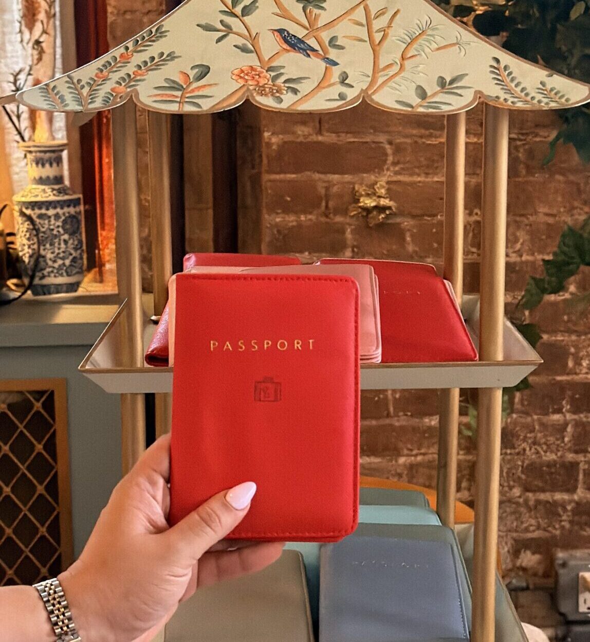 NYES live laser engraving station personalizing leather passport covers for guests