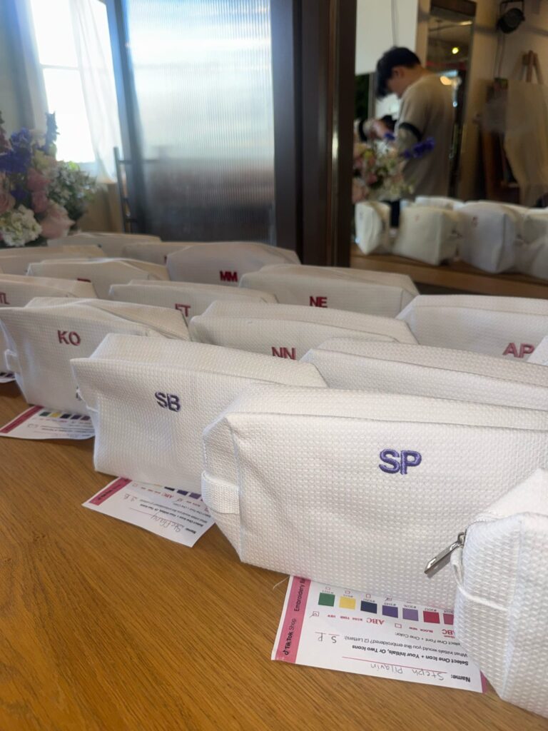 On-site embroidery station created by NYES for a TikTok Shop beauty experience.
