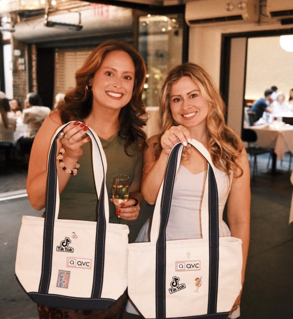 NYES team member heat pressing a custom patch onto apparel during the QVC x TikTok live brand activation.