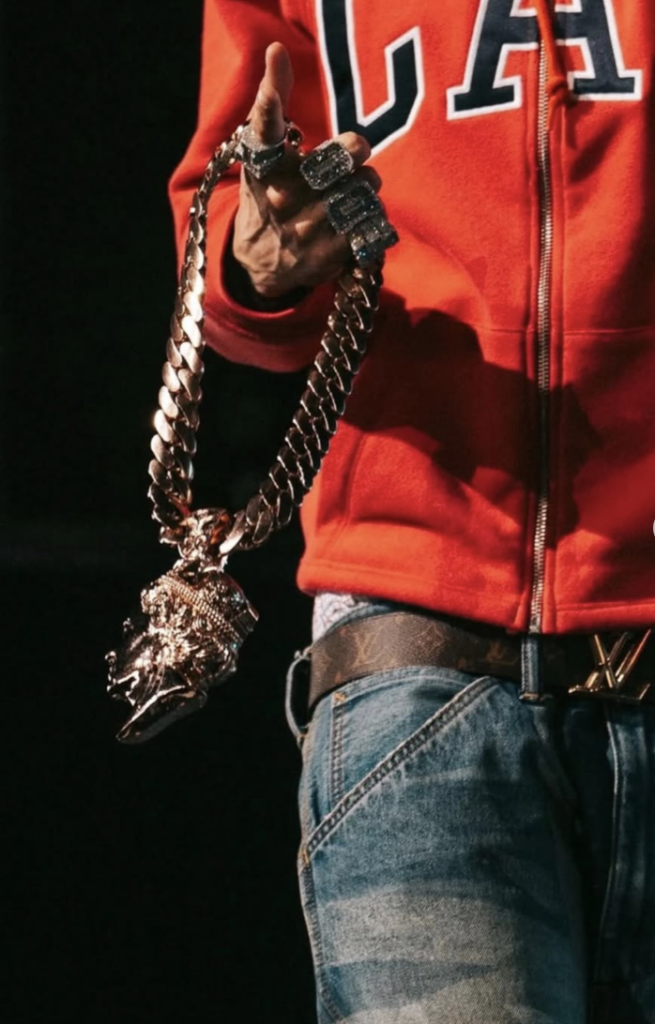 Central Cee performing on stage at Coachella wearing a custom designed outfit by GAP featuring specialized washed denim.
